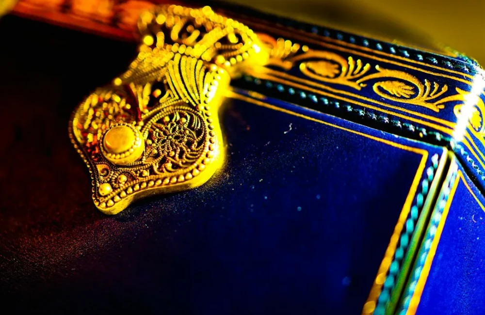 Gold jewelry presented in an open gift box