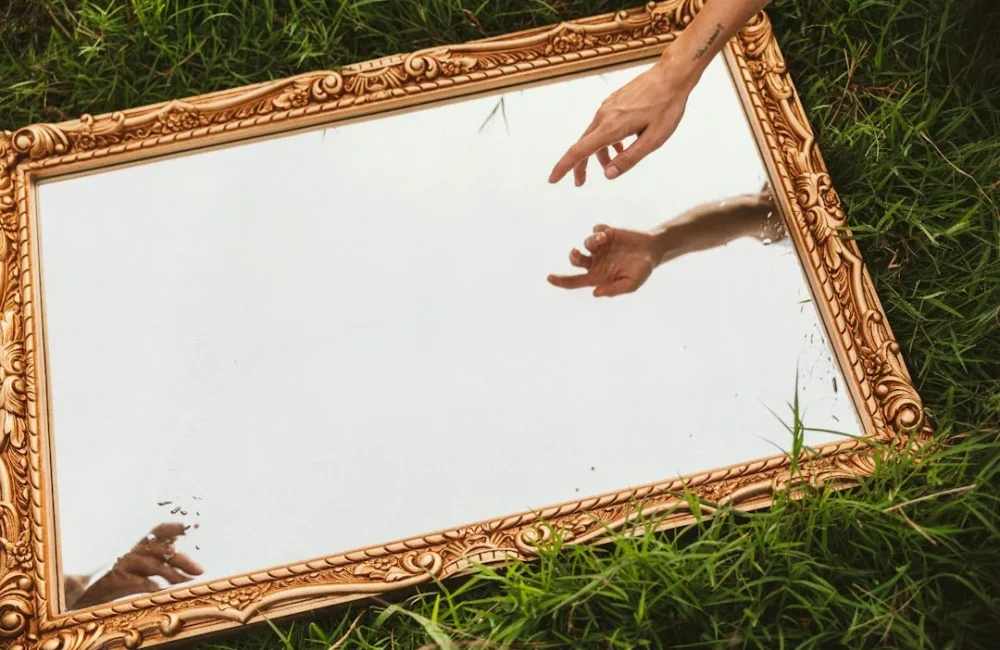 Framed mirror considered for a housewarming gift