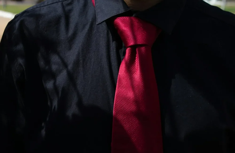 Necktie laid beside a shirt as a gift