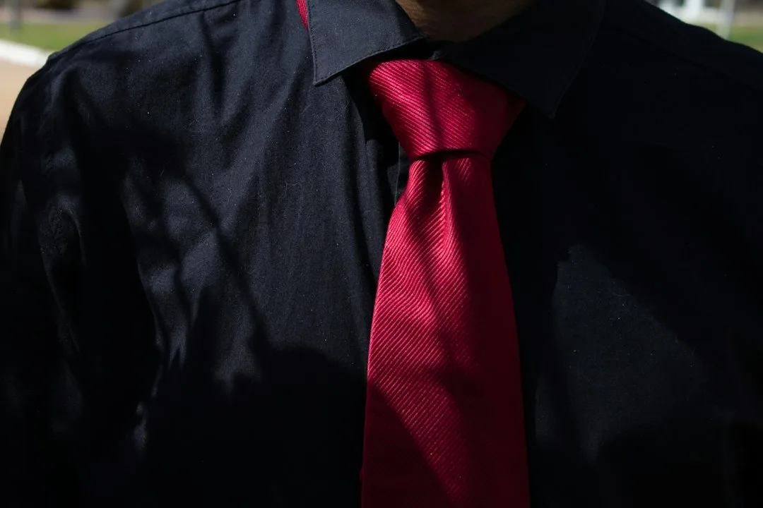 Necktie laid beside a shirt as a gift