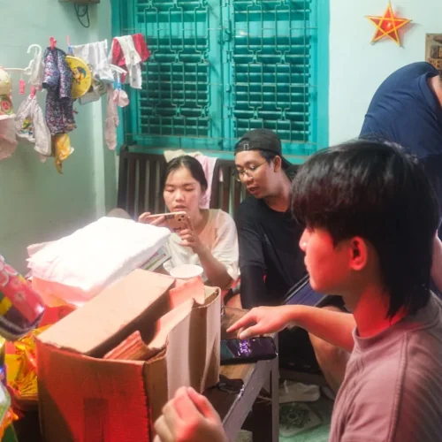 A boy opening a birthday present, illustrating the best gifts for a nephew on his birthday