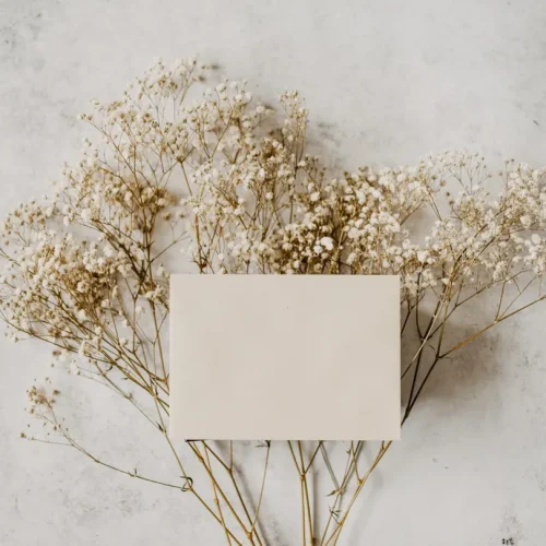 Simple, high-quality gift with minimal packaging on a clean neutral surface