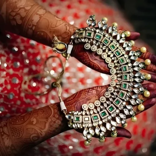 Two people wearing matching jewelry showing the meaning of receiving matching jewelry as a gift