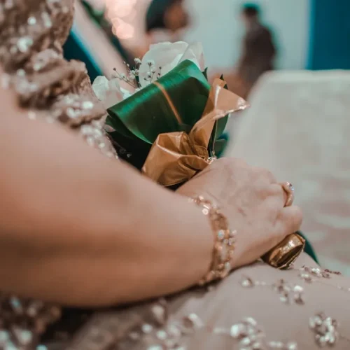 Elegant wedding gift collection including memory book, custom jewellery, and handwritten letters arranged for sister's special day